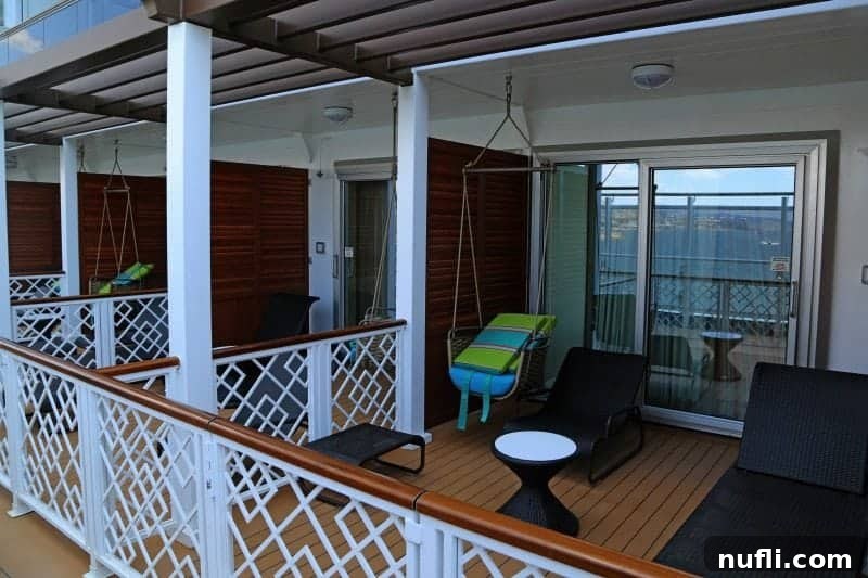 private havana suite decks off of stateroom with swinging cchairs 