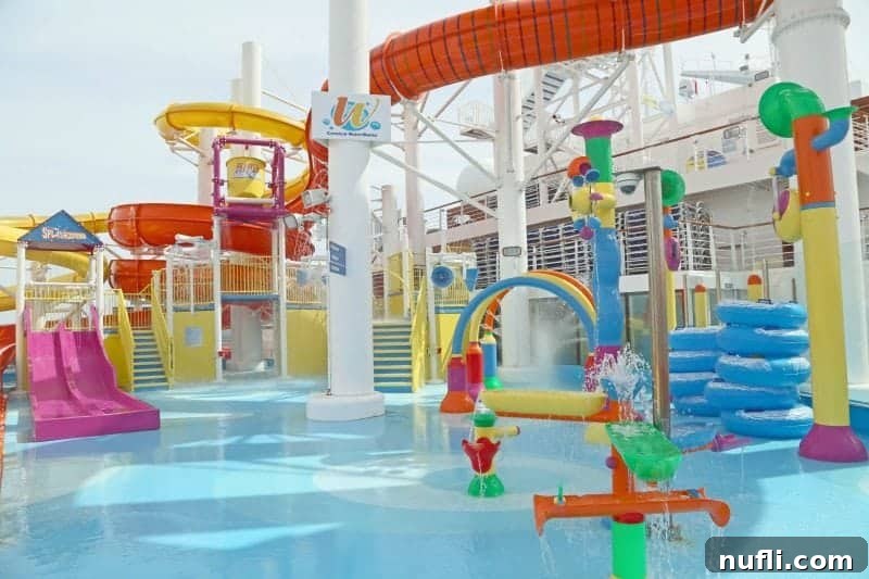 The vibrant Carnival Vista WaterWorks play area, bustling with water features and activities for endless family fun.