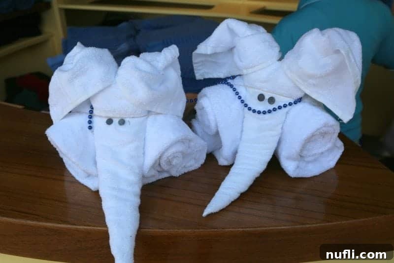 towel animal elephants with mardi gras beads