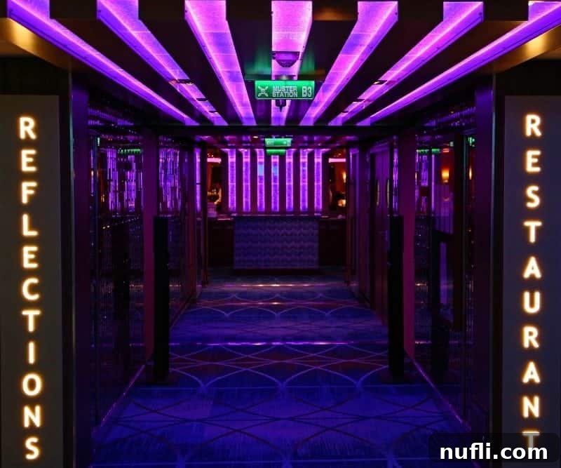 The elegant entrance to Reflections Restaurant, bathed in soft purple lighting, inviting guests to a sophisticated dining experience.