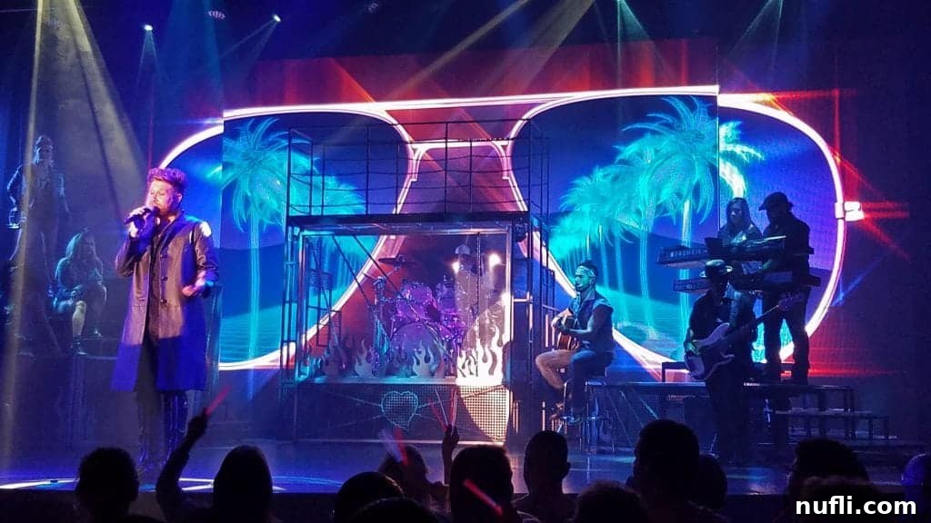Carnival Vista Unveils New Playlist Productions 4 Performers on stage during a Carnival Vista playlist production show