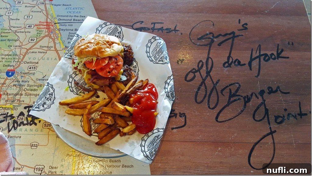 Hamburger-and-fries-at-Guys-Burger-Joint-Carnival-Conquest_thumb.jpg