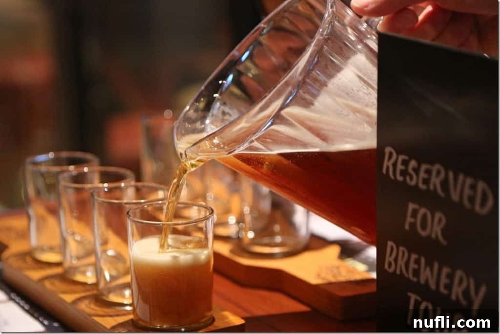 Red Frog Brewery beer tasting with beer being poured from a pitcher to a small glass