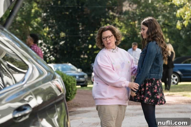 Melissa McCarthy in a vibrant scene from Life of the Party, capturing her character's transformation and spirit.