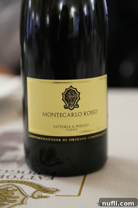 Tuscan Wine Cruise Excursion 7 Montecarlo Rosso Fattoria il Poggio wine bottle