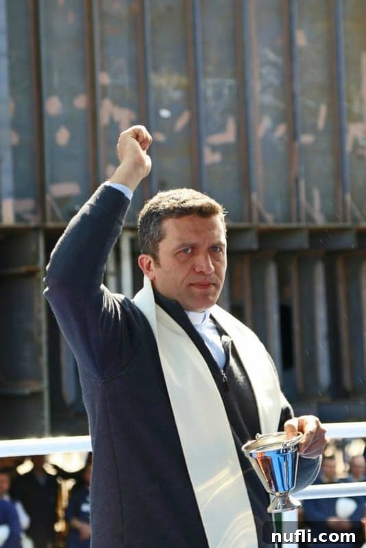 The Horizon Begins: Keel Laid for Carnival's Latest Gem in Italy 5 An Italian priest offering a solemn blessing over the partially constructed Carnival Horizon, invoking protection for the ship and its future voyages