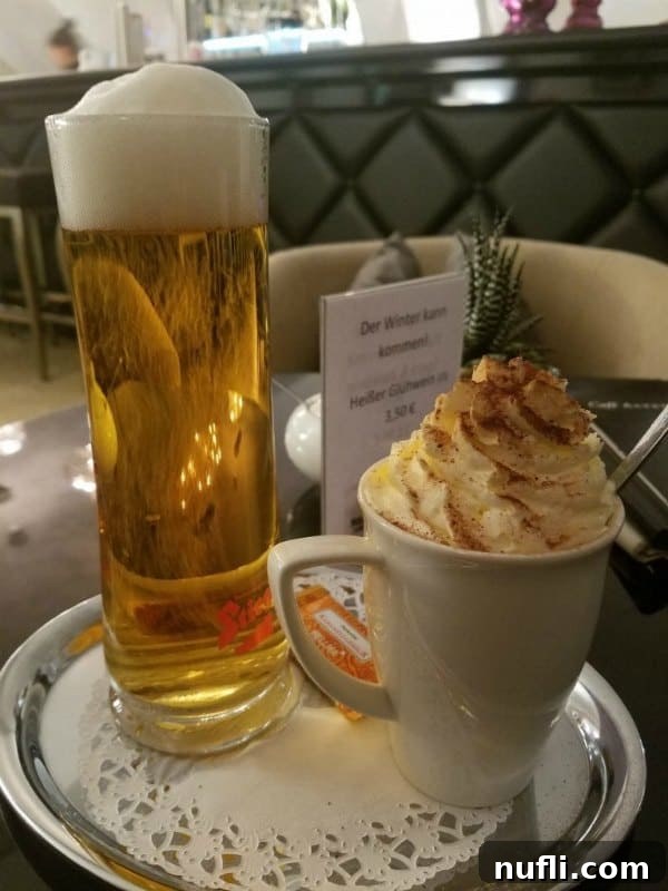 A tray with a rich hot chocolate and a glass of beer, a perfect pairing for contrasting preferences.