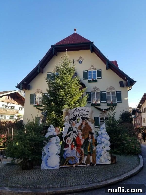 A festive St. Gilgen Advent display featuring charming holiday trees and decorations, part of a Christmas market.
