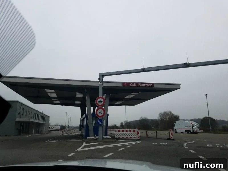 Germany: Where I Found What My Life Was Missing 4 Sign for Zoll Ramson, indicating a border crossing area between Germany and Switzerland, with road signs in the background