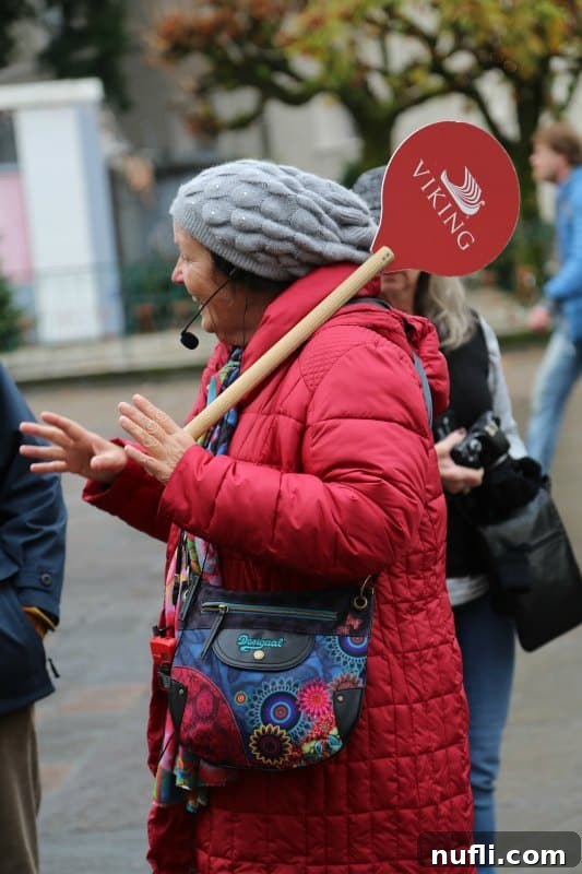 Tour guide holding a viking sign