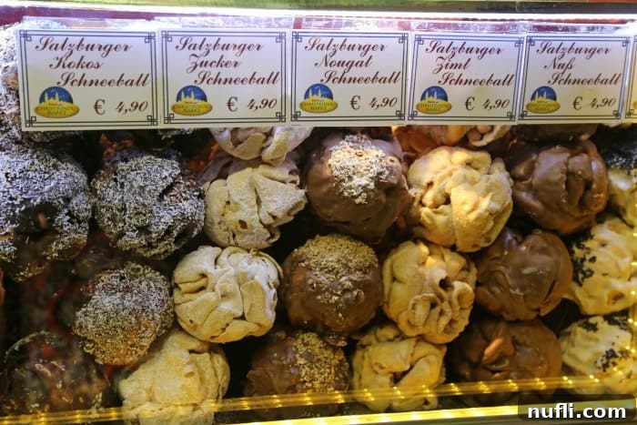 The Magic of Salzburg's Yuletide 9 Artfully arranged display of Schneeball pastries, dusted with powdered sugar