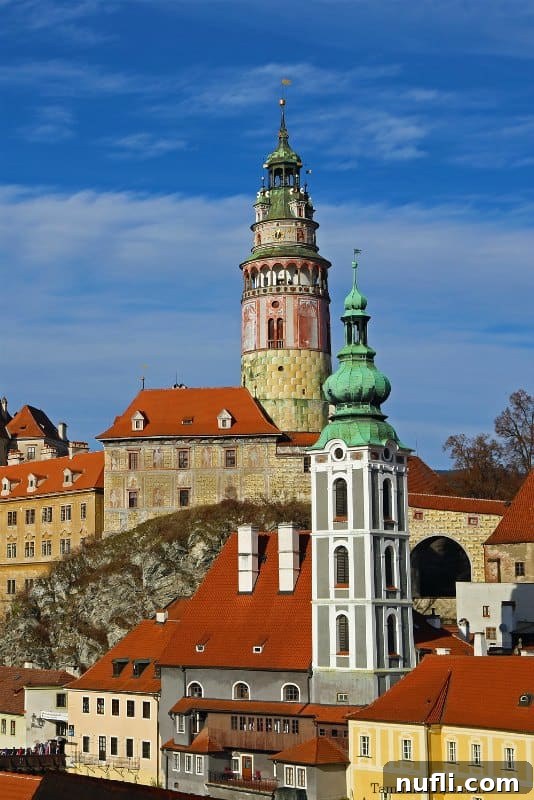 Historic buildings of Cesky Krumlov with a prominent castle tower in the background