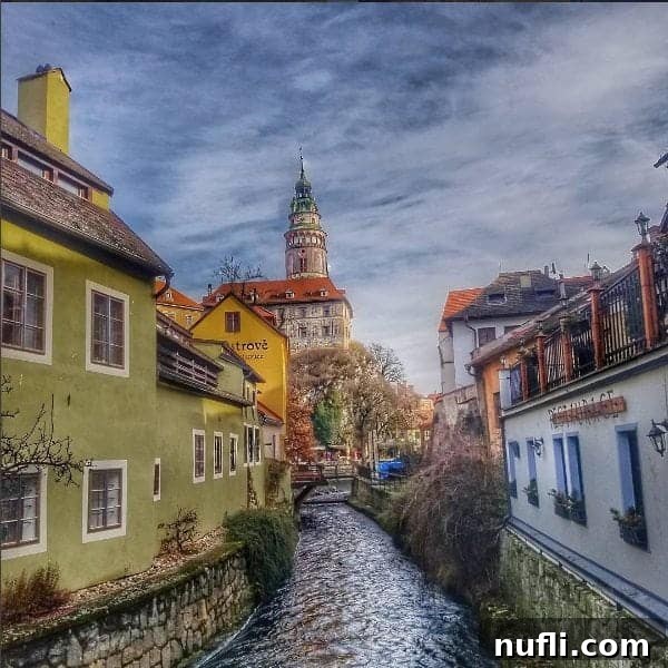 Scenic view of Cesky Krumlov castle and historic buildings along the Vltava River