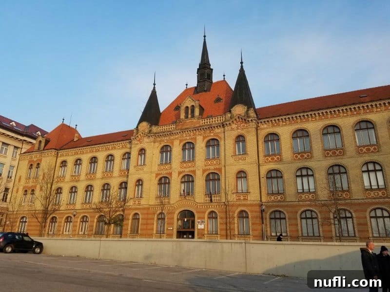 Historic building with vibrant yellow facade in Bratislava, Slovakia