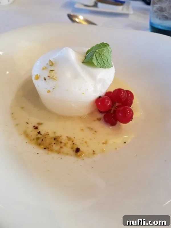 Delicious poached meringue in vanilla cream, a dessert served onboard