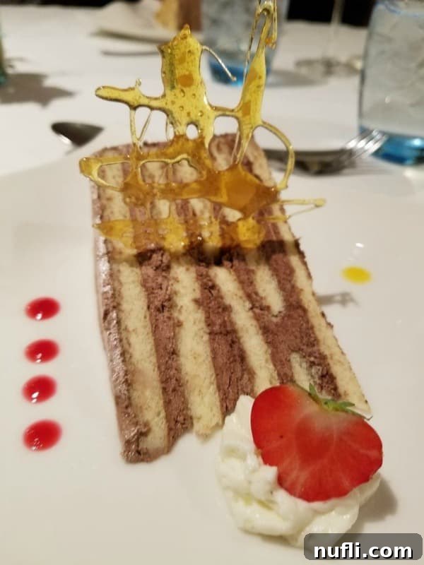 cake with sugar work and a strawberry 