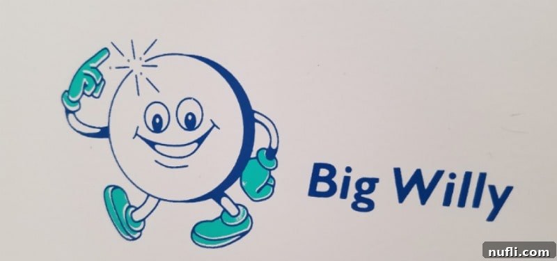 Big Willy next to toilet paper sign 