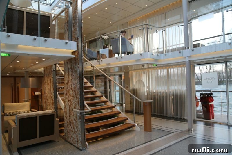The Viking Vili River Cruise Ship: An Inside Look 15 Stairs and lounge area on the Viking Vili