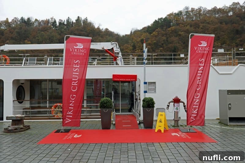 The Viking Vili River Cruise Ship: An Inside Look 22 Viking Cruises signs over a red carpet leading onto the ship