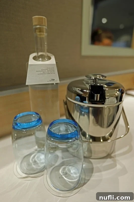 The Viking Vili River Cruise Ship: An Inside Look 7 Bottle of water next to glasses and an ice bucket