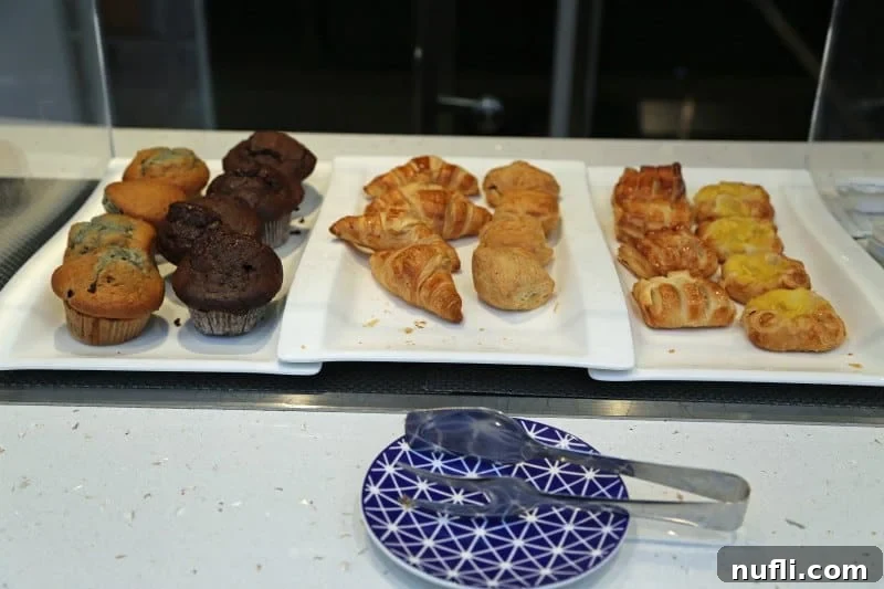 The Viking Vili River Cruise Ship: An Inside Look 9 Trays with muffins, croissants, and danishes