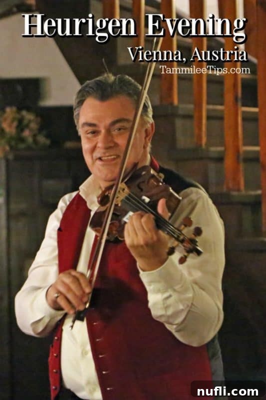 A musician playing a violin charmingly during a Heurigen Evening in Vienna, with blurred guests in the background enjoying the traditional celebration.