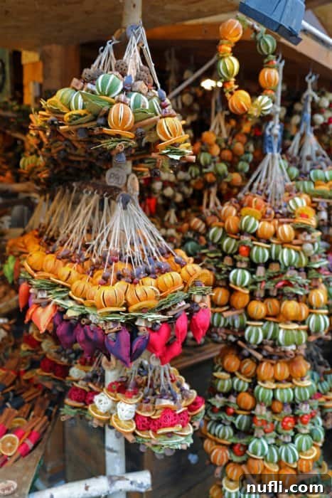 Bundles of dried fruit in hanging arrangements
