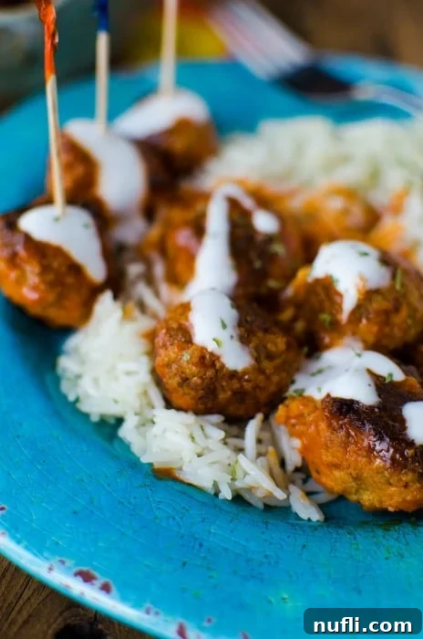 Crockpot buffalo chicken meatballs on a blue plate