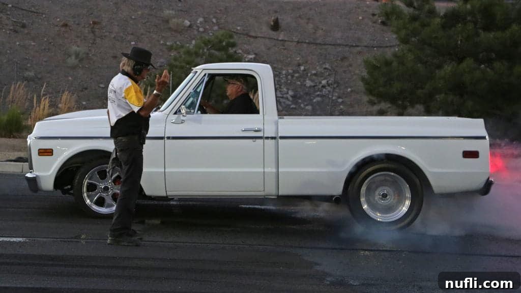 Hot August Nights Reno: The Classic Car Extravaganza 5 White truck next to a gentleman starting the drag race