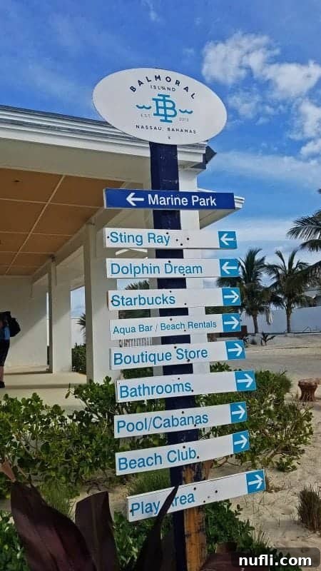 Balmoral Island sign with directional arrows pointing to various amenities