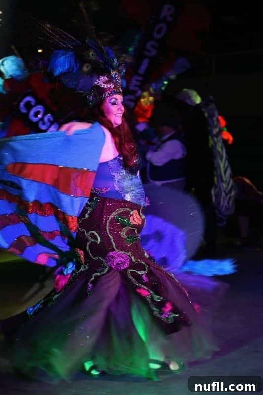 women smiling in mardi gras gear