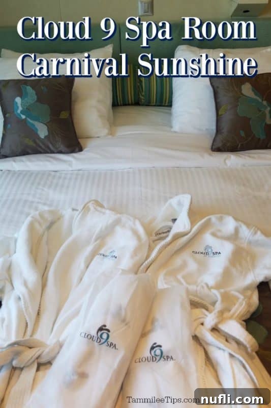 Carnival Cloud 9 Spa Balcony Room on Carnival Sunshine with two robes and slippers on the bed