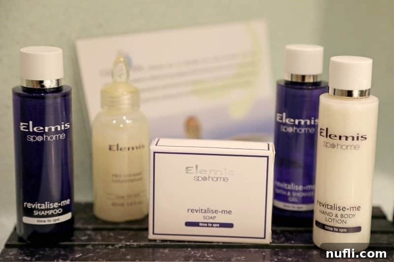 Premium Elemis spa products on a tray in the Carnival Cloud 9 Spa Room bathroom