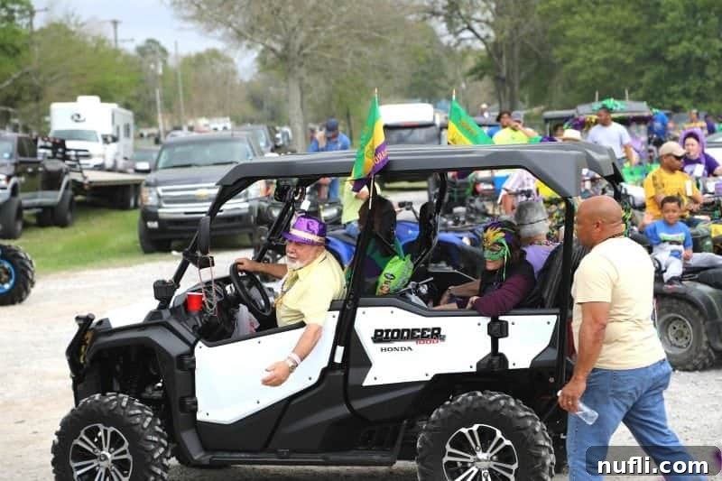 A festive golf cart, elaborately decorated for Mardi Gras with streamers, masks, and colorful beads, ready for the parade.