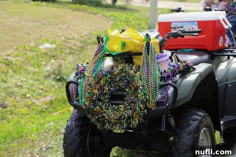An ATV adorned with a festive wreath and colorful beads, a common sight in the vibrant Iowa Chicken Run procession.