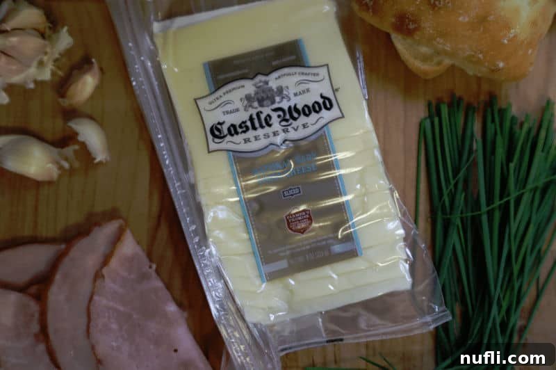 Garlic Aioli Ham and Swiss Ciabatta 3 Package of Castle Wood Reserve cheese, highlighting premium deli quality.