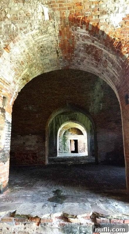 Best Things to Do in Orange Beach and Gulf Shores Alabama 11 A historic brick walkway at Fort Morgan, inviting visitors to step back in time and explore its rich past.