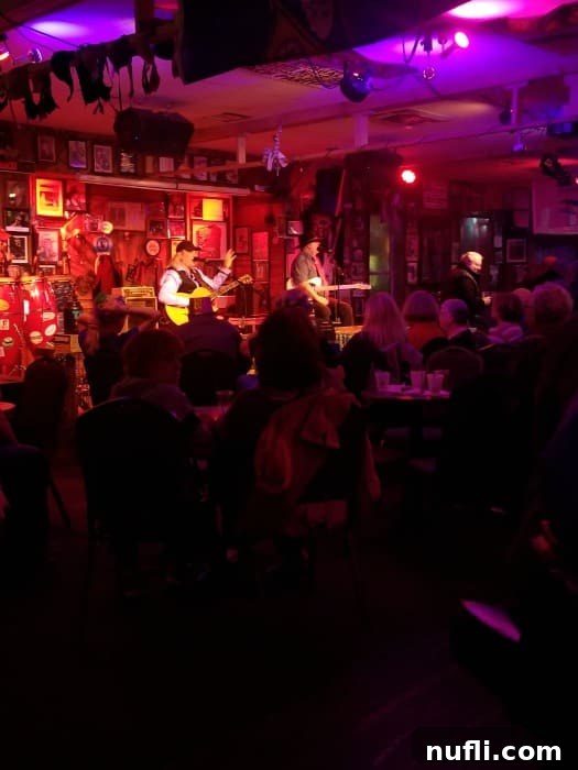 Best Things to Do in Orange Beach and Gulf Shores Alabama 18 A lively band performing at The Flora-Bama, capturing the energetic atmosphere of this legendary roadhouse on the state line.
