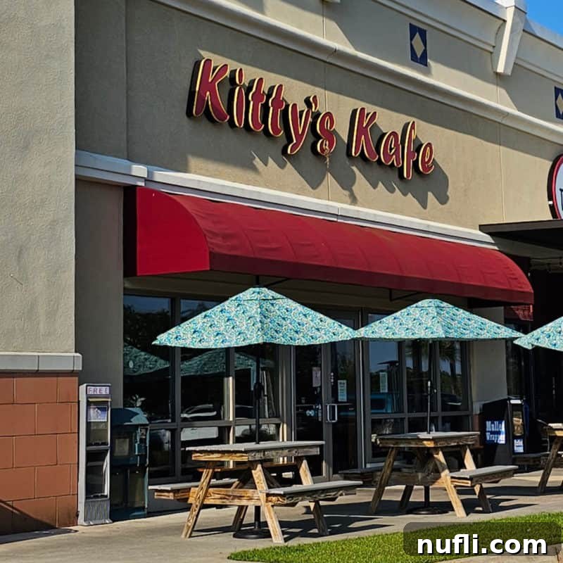 Orange Beach and Gulf Shores Must Try Restaurants 15 Kitty's Kafe exterior with picnic tables