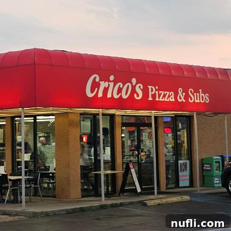 Orange Beach and Gulf Shores Must Try Restaurants 16 Crico's Pizza & Subs entrance with red awning