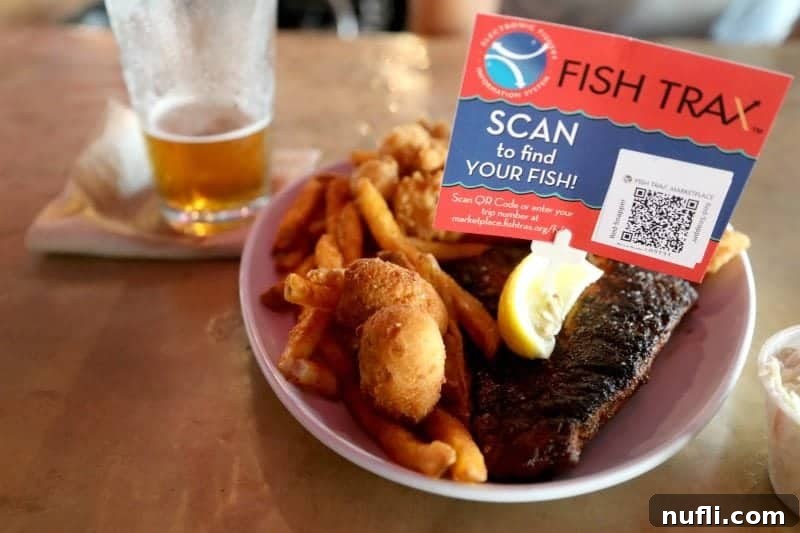 Orange Beach and Gulf Shores Must Try Restaurants 5 Fish Trax scan sign over a plate of seafood