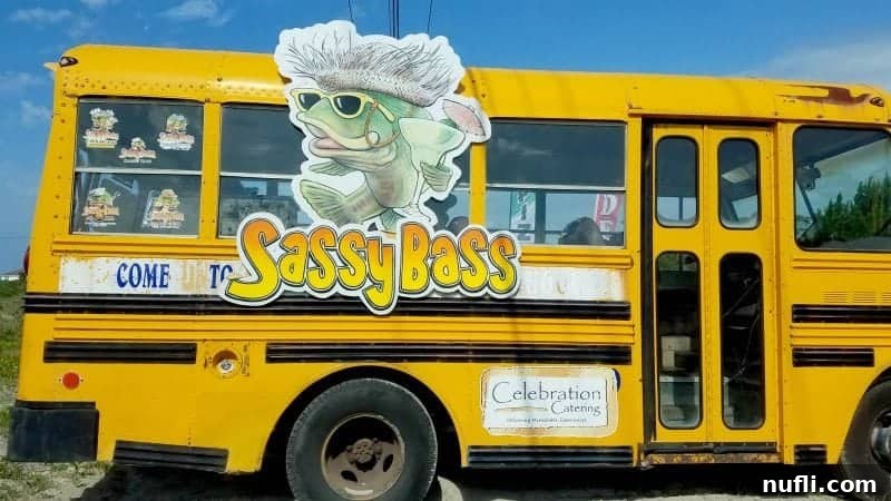 Orange Beach and Gulf Shores Must Try Restaurants 55 Sassy Bass sign on a yellow school bus
