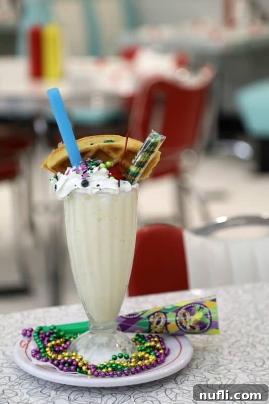 Orange Beach and Gulf Shores Must Try Restaurants 9 milkshake with Mardi gras beads, and a waffle in it