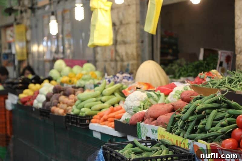 Mahane Yehuda Market Jerusalem's Culinary Soul 15 A vibrant assortment of fresh vegetables beautifully displayed for sale