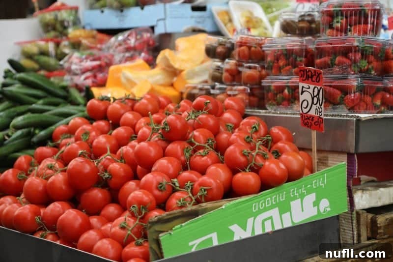 Mahane Yehuda Market Jerusalem's Culinary Soul 8 Fresh tomatoes, cucumbers, and vibrant strawberries artfully displayed in Mahane Yehuda Market