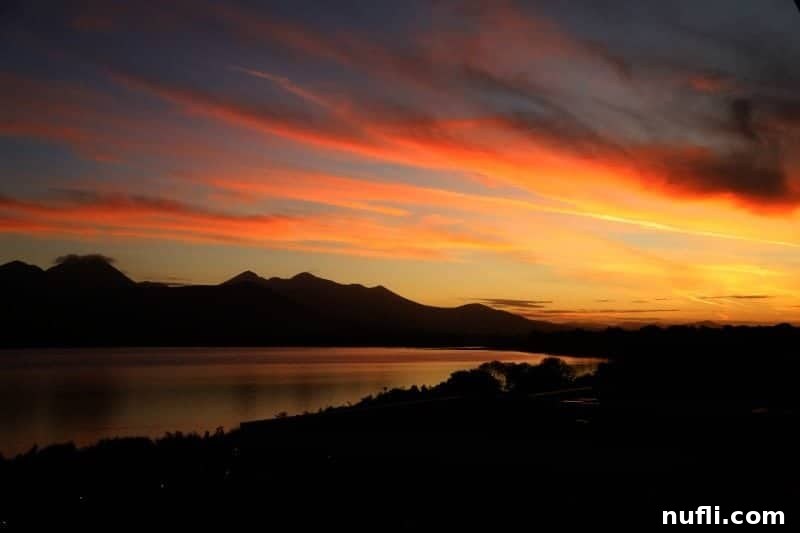 Lakeside Elegance in Killarney: The Europe Hotel 15 Breathtaking sunset casting vibrant hues over the tranquil lake beside The Europe Hotel Killarney.