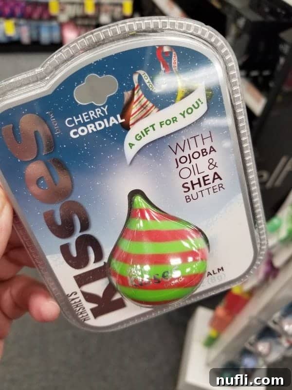 Beyond Prescriptions: Amazing Gifts and Stocking Stuffers at CVS 27 A Hershey's Kiss lip balm, a sweet and nostalgic beauty item perfect for chocolate and lip care fans.