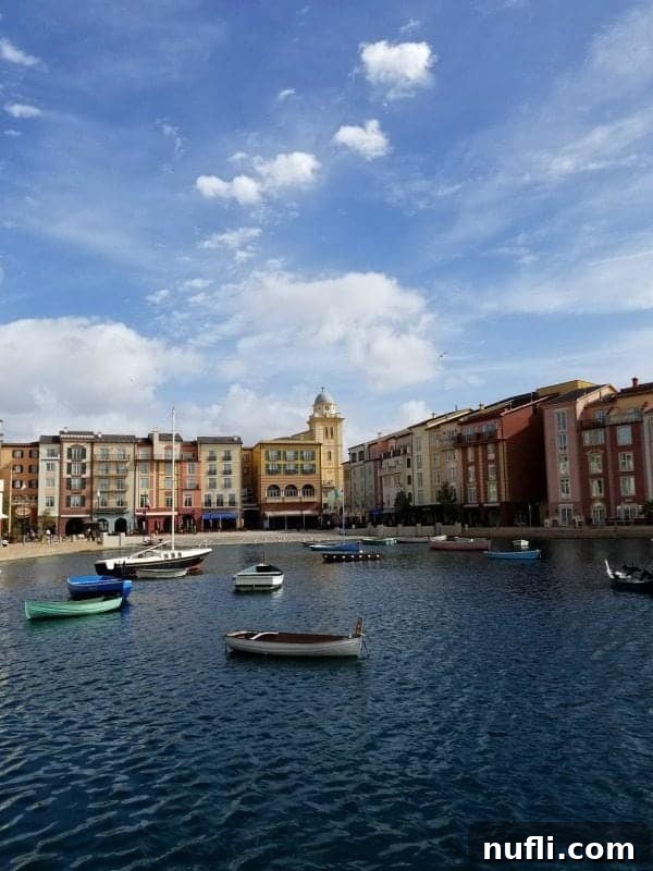 water with boats floating in front of Portofino Bay Hotel at Universal Orlando 