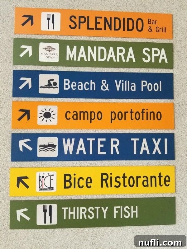 hotel sign with pool and water taxi arrows