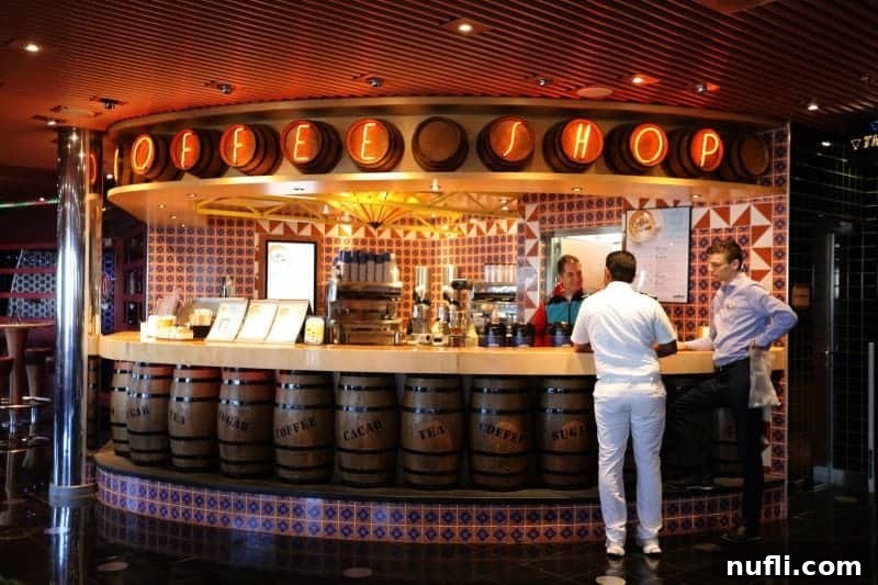 The inviting coffee shop on the Carnival Splendor, featuring a prominent sign above the bar where guests gather for their favorite beverages.